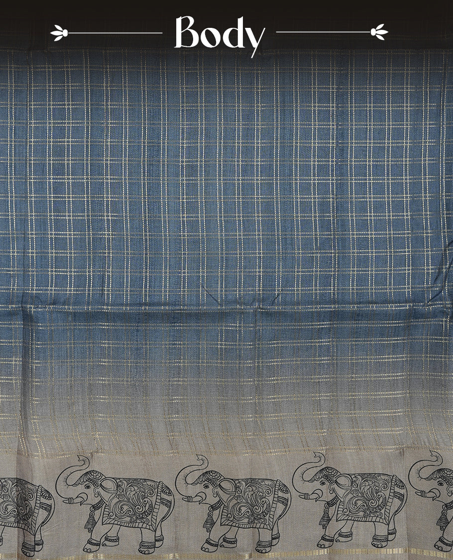 Ash blue colour semi tusser silk saree featuring Gold zari check pattern across body, faded contrast cream colour border with elephant print and paired with matching blouse.