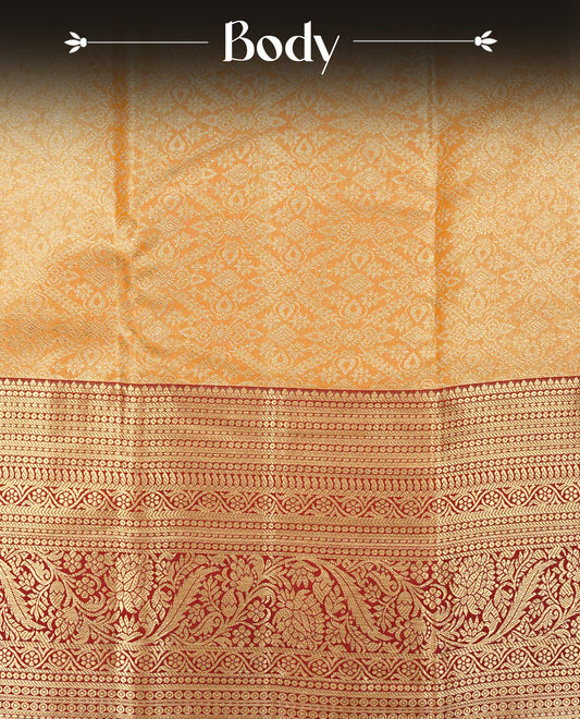 Mustard yellow Colour Semi Tissue Silk Saree featuring Floral Kodi Gold Zari Work on the body, complemented by an intricately woven gold zari pallu, a rich Maroon and gold zari border, and paired with a matching plain blouse piece