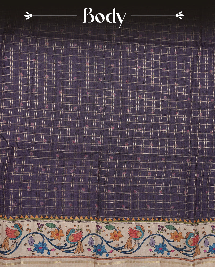 Violet colour semi tusser silk saree featuring gold zari check pattern with floral butti motifs, with contrast floral kodi & bird pattern and paired with matching blouse.