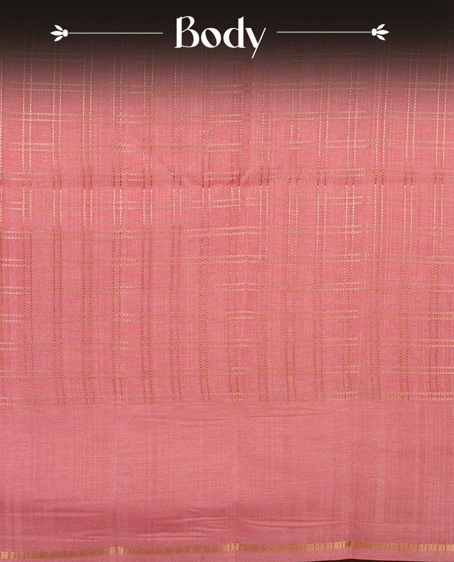 Baby pink colour semi Tussar saree highlights gold zari check pattern across body,  border, pallu and paired with matching blouse piece.