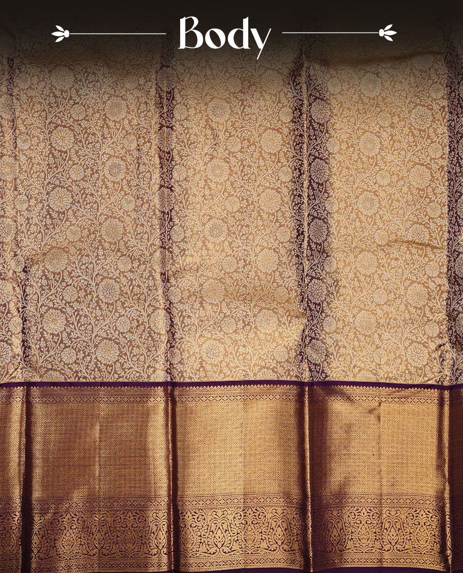Gold colour kancheepuram tissue silk saree featuring gold zari pattern across body, complemented by contrast purple colour border traditional zari border, paired with matching blouse piece.