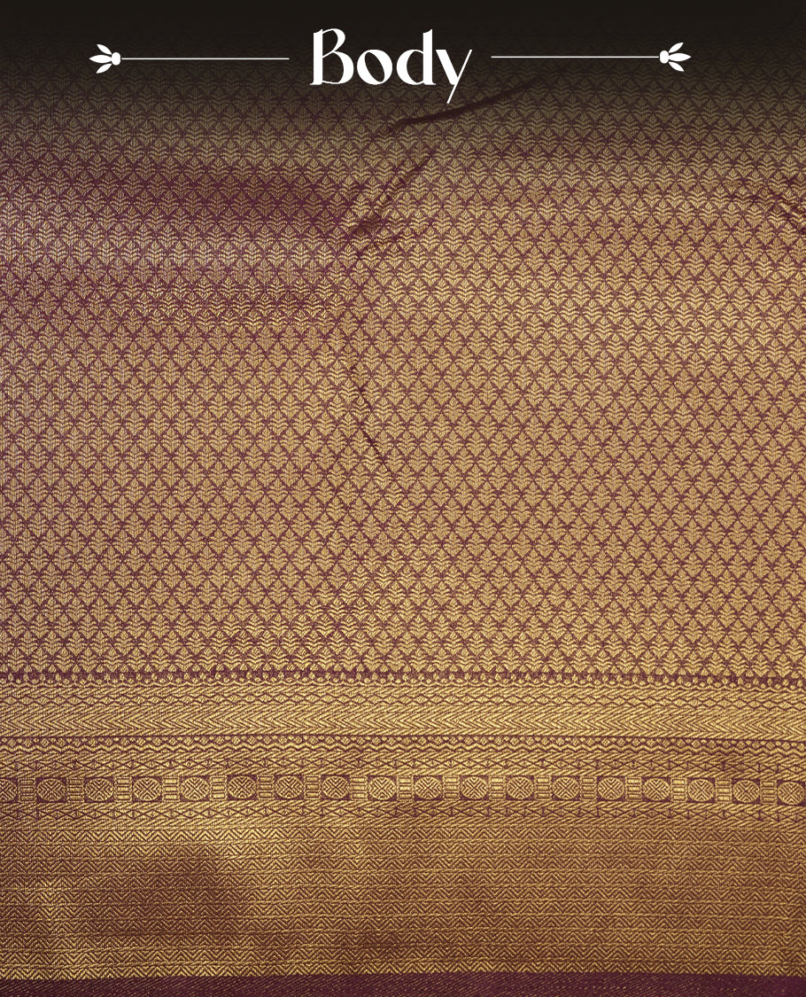 Burnt burgundy colour semi soft silk saree featuring gold zari motifs on across body, self colour border with traditional gold zari pattern, pallu and paired with matching blouse.