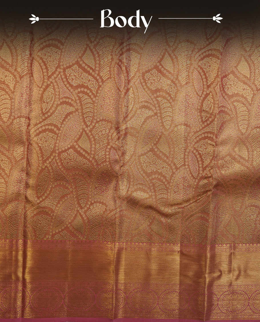 Pink & gold double shade colour kancheepuram tissue silk saree highlighting gold zari pattern body, with contrast Pink colour colour with traditional border and paired with matching blouse.