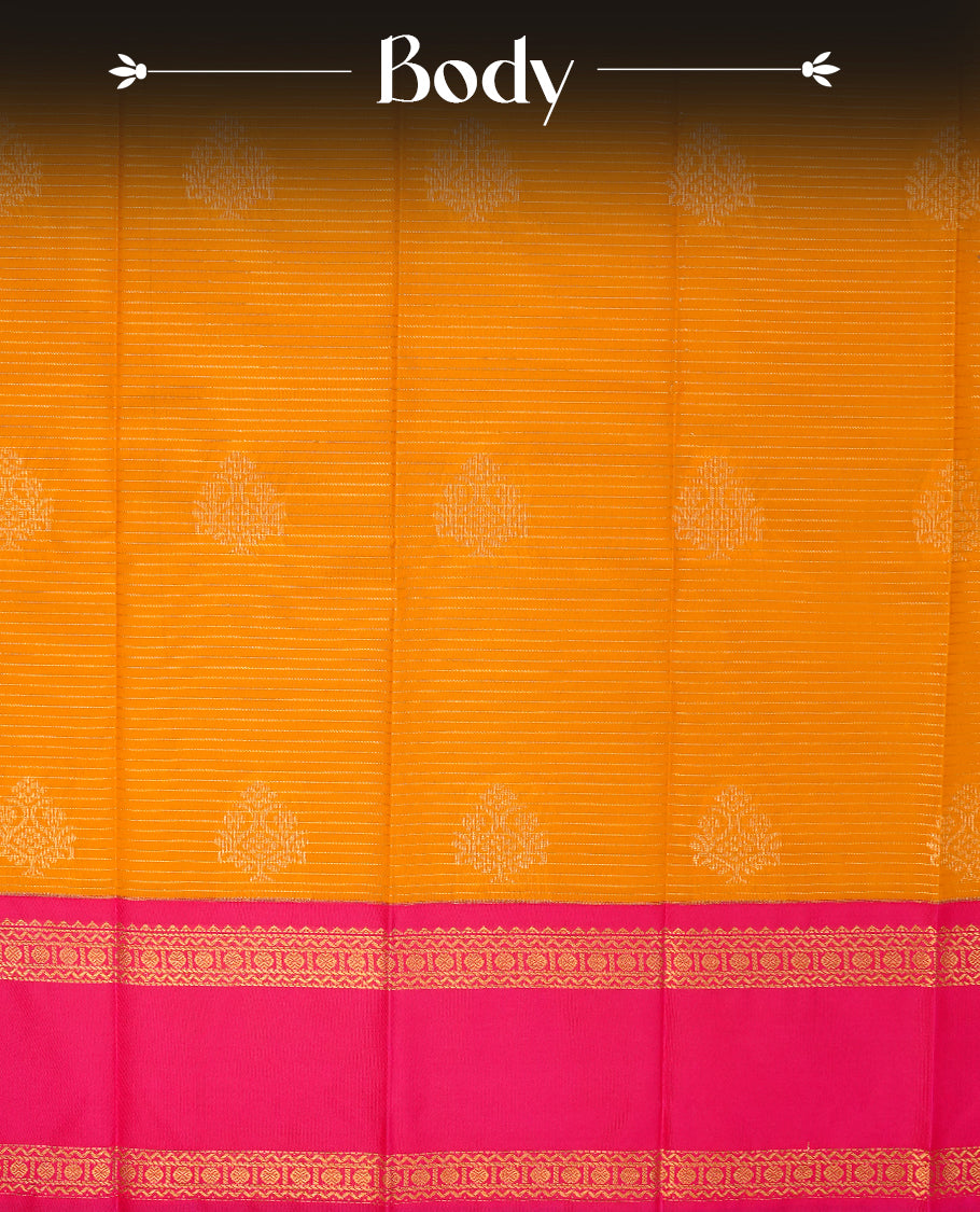 Mustard coloured soft silk saree featuring gold zari stripes and motifs across the body, enhanced with a contrast rani pink border and pallu, paired with a matching contrast blouse piece.