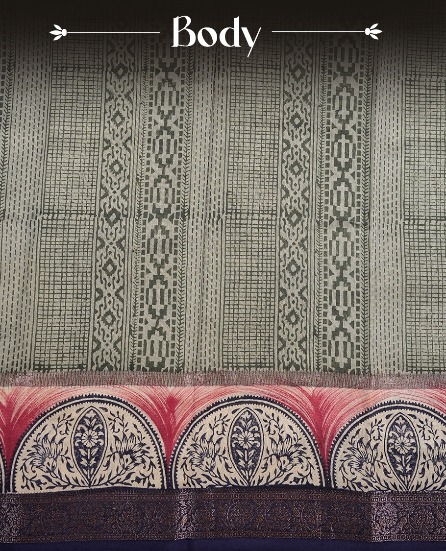 Greenish Gray colour chanderi silk saree featuring geometric print pattern across body, with contrast Blue colour border with zari pattern and paired with matching blouse.