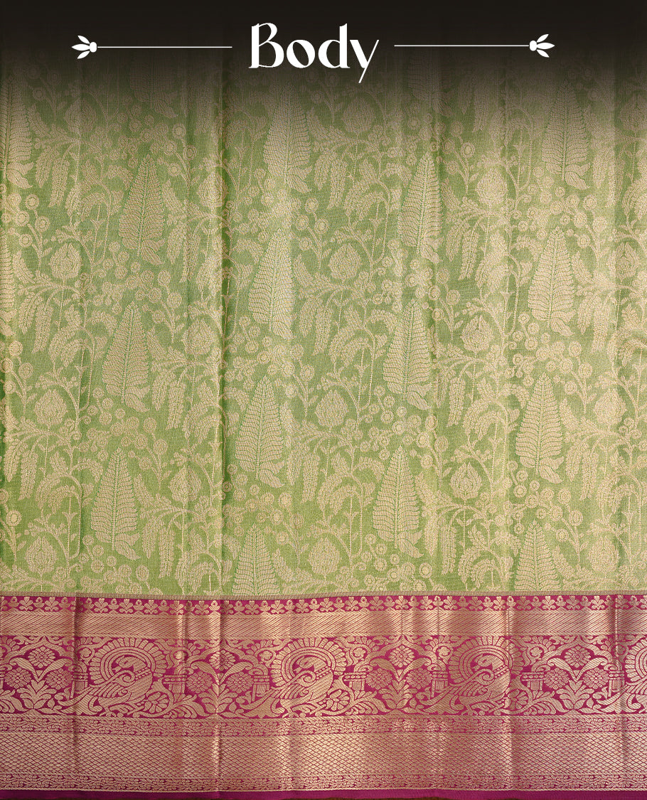 Green & gold double shade colour semi tissue silk saree featuring gold zari floral kodi pattern on body, contrast magenta colour with gold zari traditional border, paired with matching blouse piece.