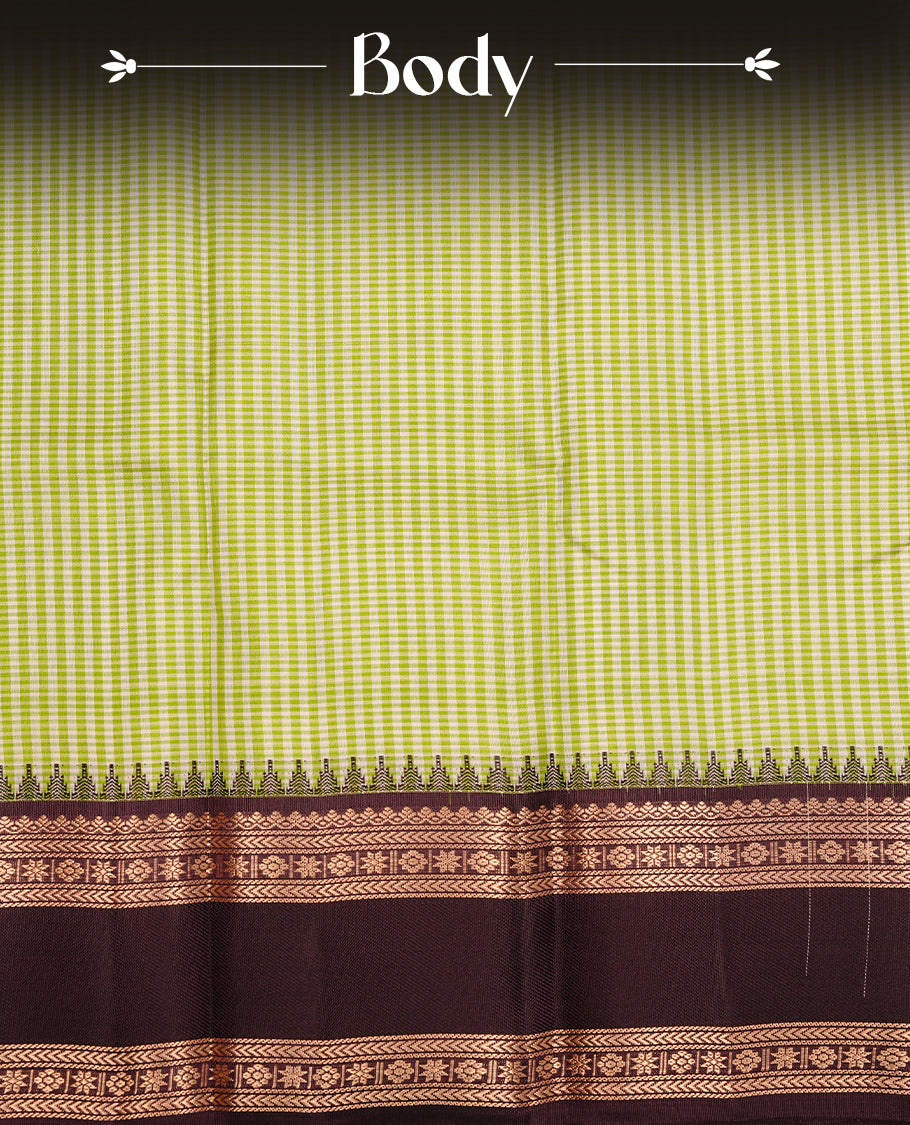 Yellow & green  colour traditional kancheepuram silk saree featuring check pattern on body, complemented by contrast deep purple colour with gold zari traditional border, paired with matching blouse piece.