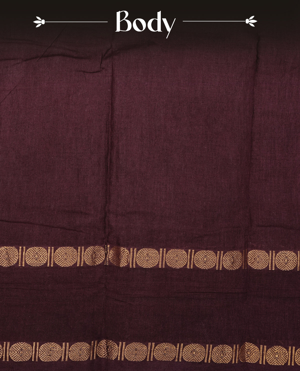 Dark Wine Colour  Sungudi Cotton Saree with gold zari motifs on the body, a matching gold zari border, and a plain pallu. Paired with a contrast Reddish Pink colour  blouse piece  featuring a gold zari peacock border.