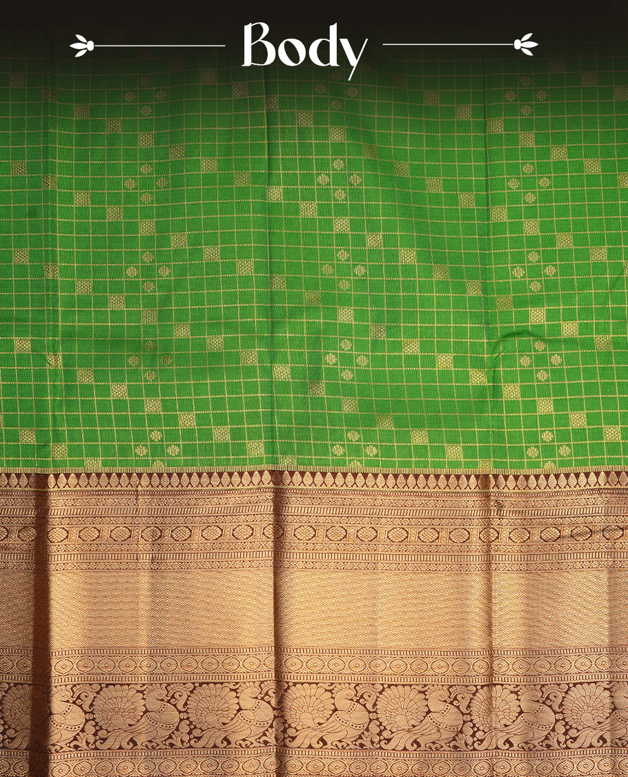 Bottle green colour semi wedding saree featuring gold zari check with motifs on body, contrast chocolate colour with traditional border, paired with matching blouse piece.