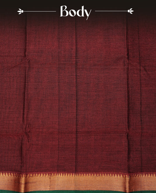 Maroon colour  Narayanapattu cotton saree with a plain body, complemented by a Green colour with Gold Zari temple designed border & contrast pallu, paired with a matching blouse piece