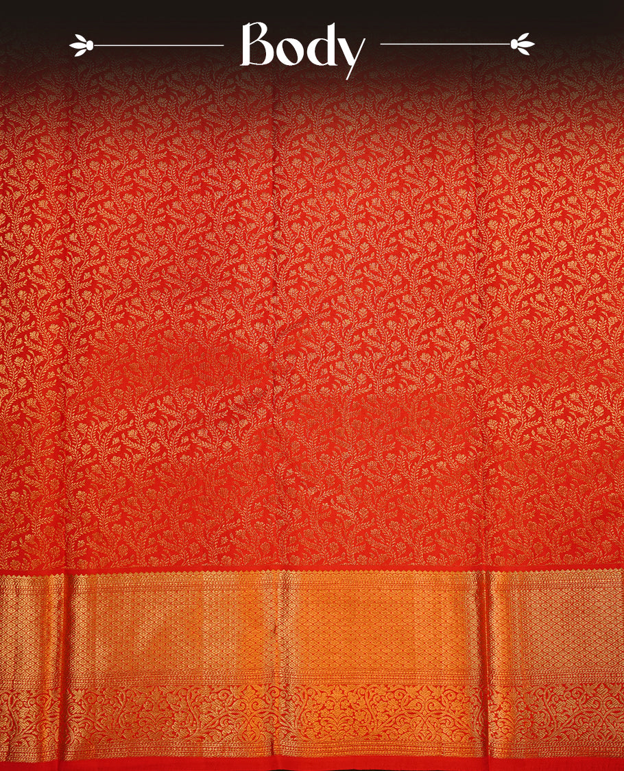 Red colour kancheepuram silk sareee featuring gold zari floral kodi pattern on body, complemented by self colour with traditional border, paired with matching blouse piece.