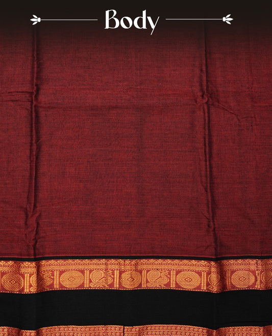 Dark Red colour Narayanapattu cotton saree with a plain body, complemented by a Green Colour with Gold zari border & contrast pallu, paired with a matching blouse piece.