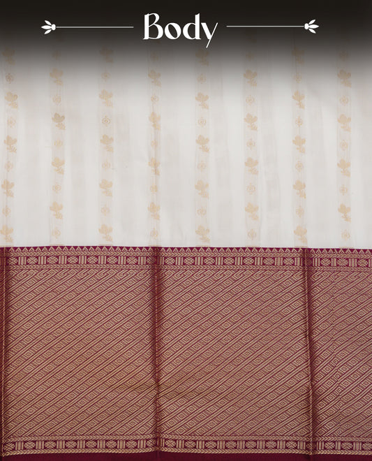 Off white colour silk saree featuring gold zari buttas on body, contrast maroon with gold zari traditional border, contrast grand pallu comes with matching blouse piece .