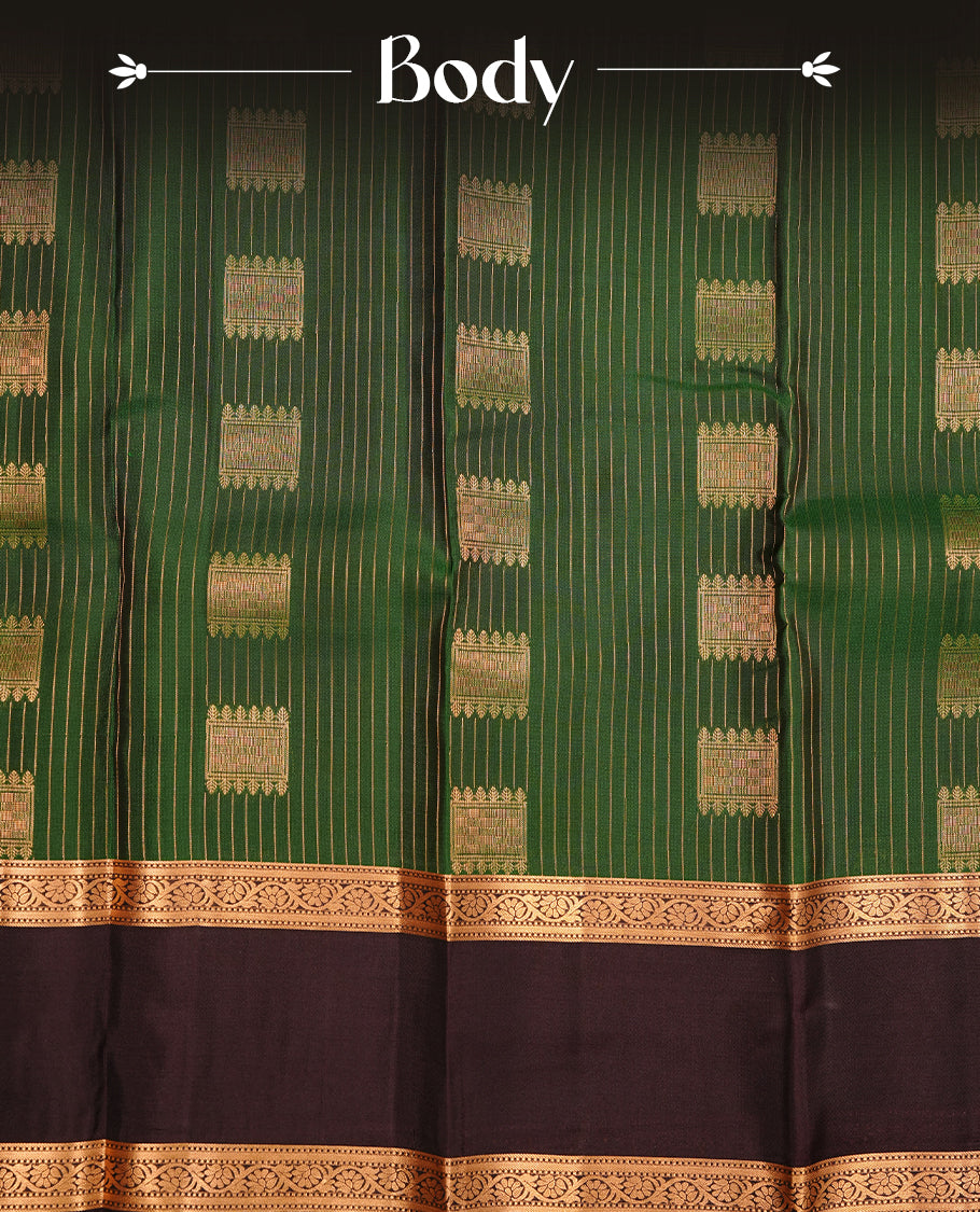 Green colour traditional kancheepuram silk saree featuring gold zari stripes & motifs on body, complemeneted by contrast chocolate colour with traditional border, paired with matching blouse piece.
