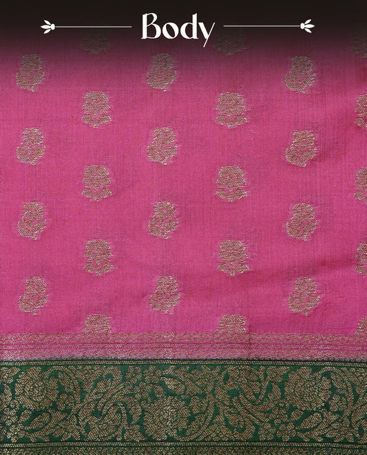 Vibrant pink Colour Tussar silk saree with antique zari buttas On Body, a rich green zari border, an elegant pallu, Paired With  a matching blouse piece.