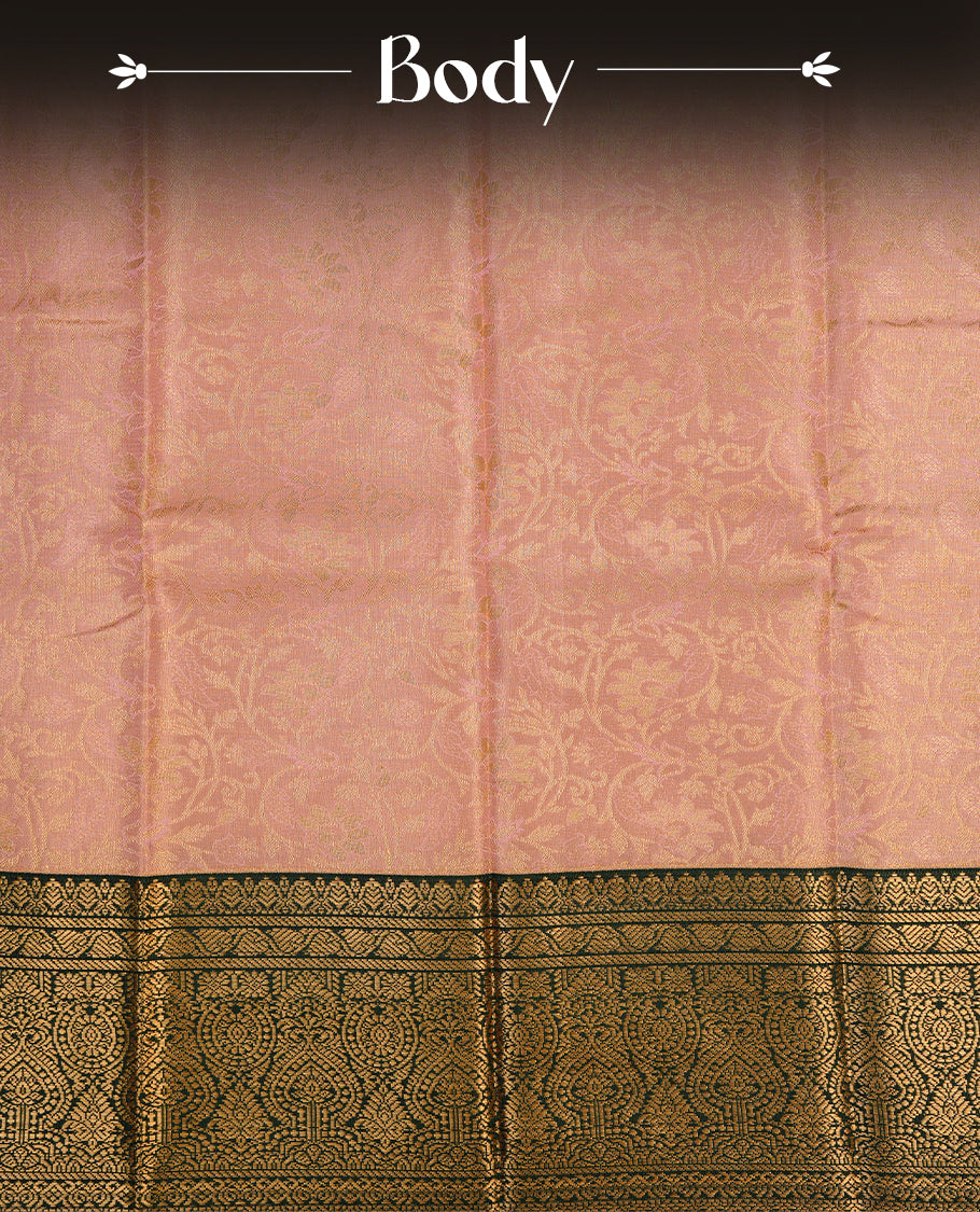 Baby pink colour semi tissue silk saree featuring gold zari floral kodi pattern on body, contrast green colour with gold zari traditional border, paired with matching blouse piece.