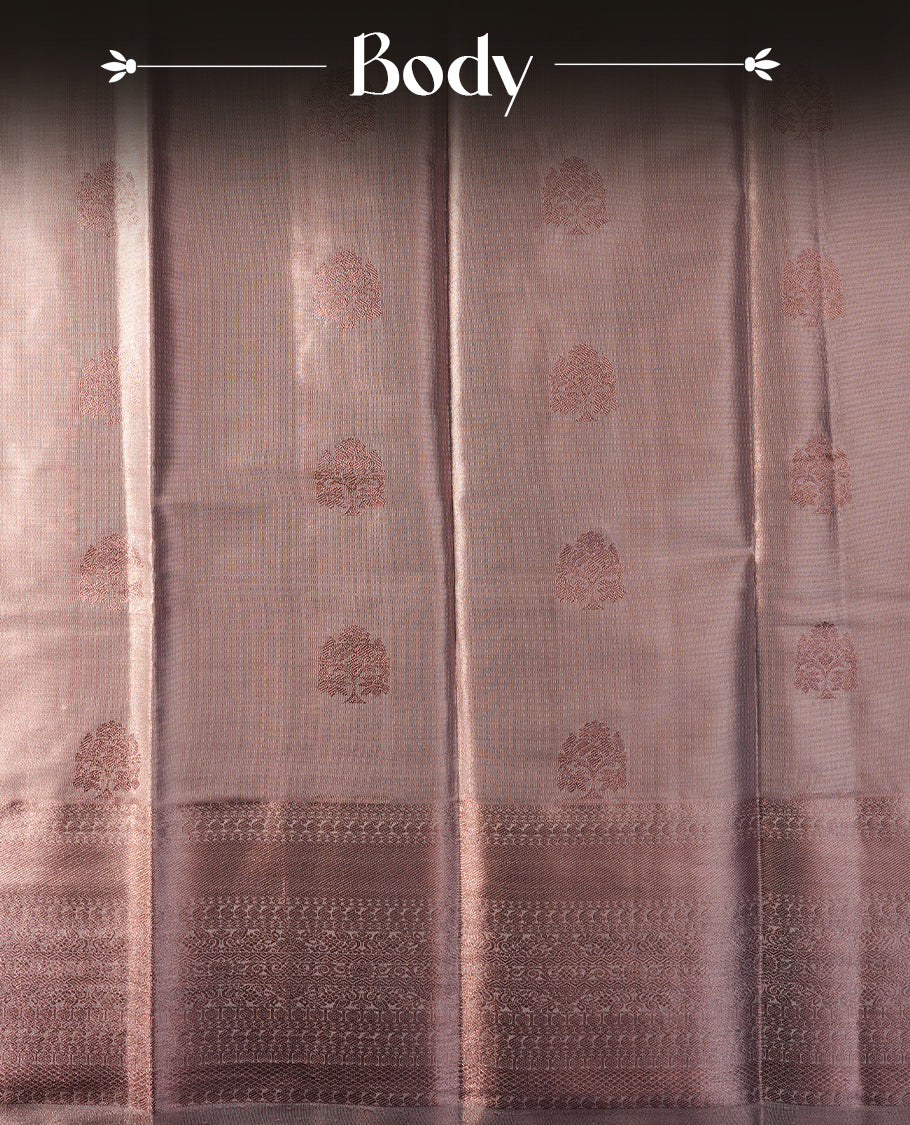 Copper colour semi tissue silk saree featuring copper zari pattern on body, selfcolour with gold zari traditional border, paired with matching blouse piece.