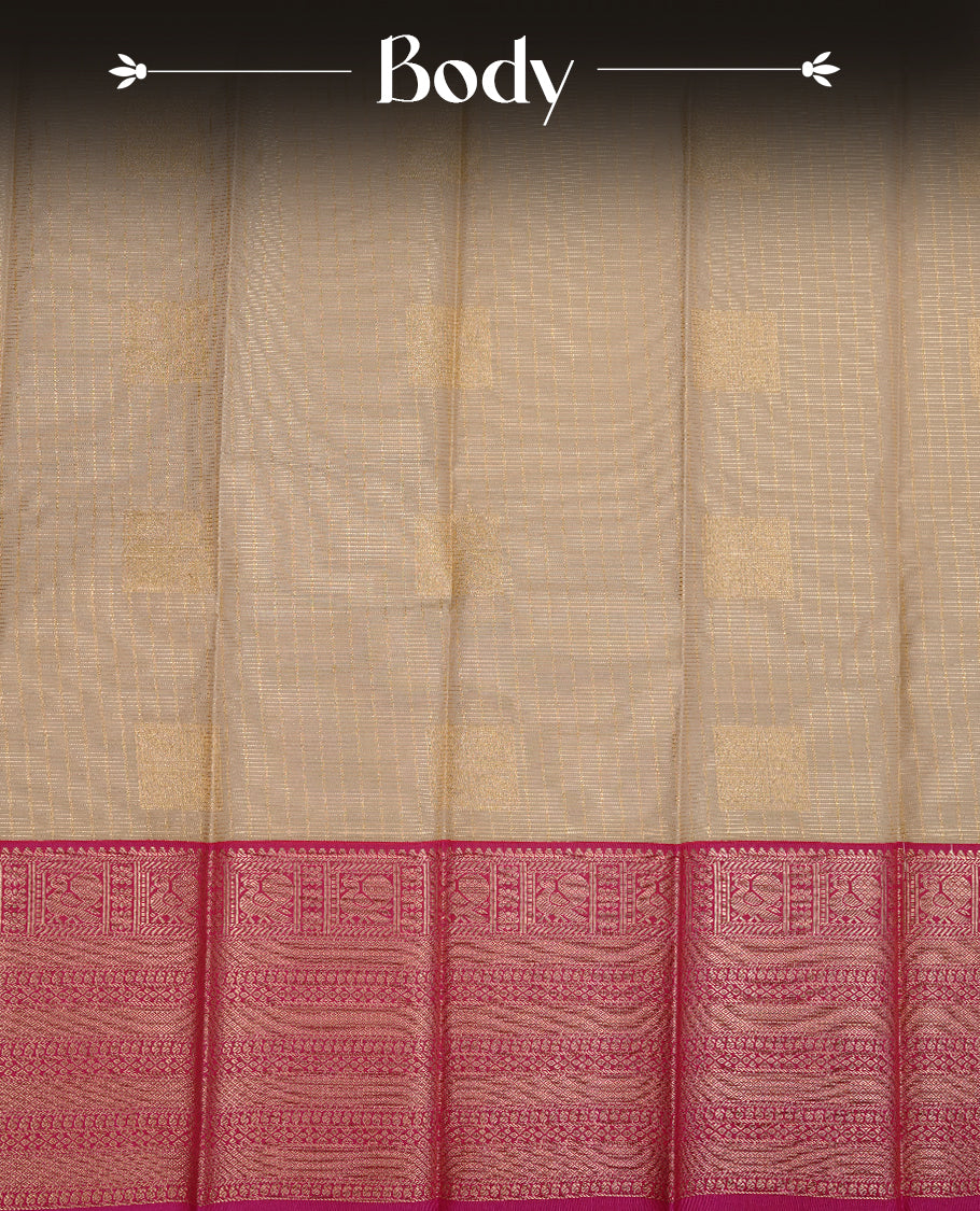 Cream coloured soft silk saree featuring gold zari stripes and motifs across the body, enhanced with a contrast Magenta border and pallu, paired with a matching contrast blouse piece.