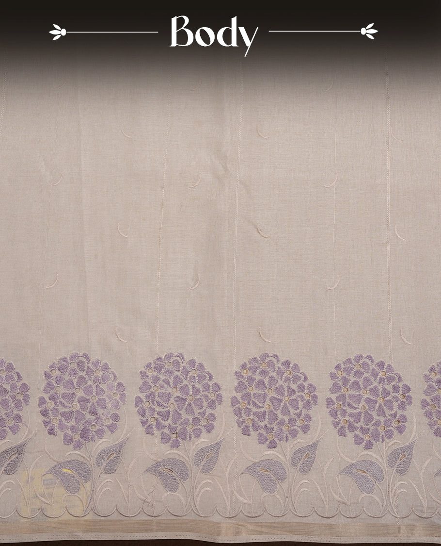 Beige colour Tussar silk saree featuring Elegant plain body, highlighting Lavender colour floral cut work with Light gold zari border, pallu and paired with matching blouse piece.