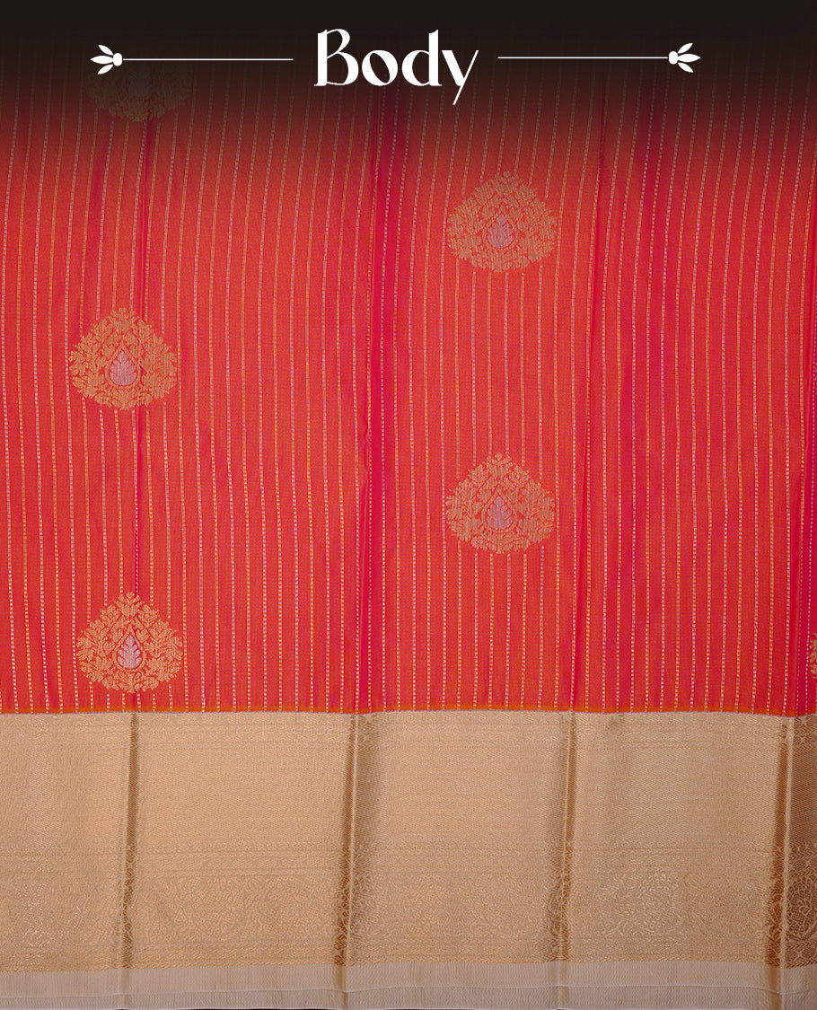 Orange coloured soft silk saree featuring gold zari stripes and motifs across the body, enhanced with a contrast Cream border and pallu, paired with a matching contrast blouse piece.