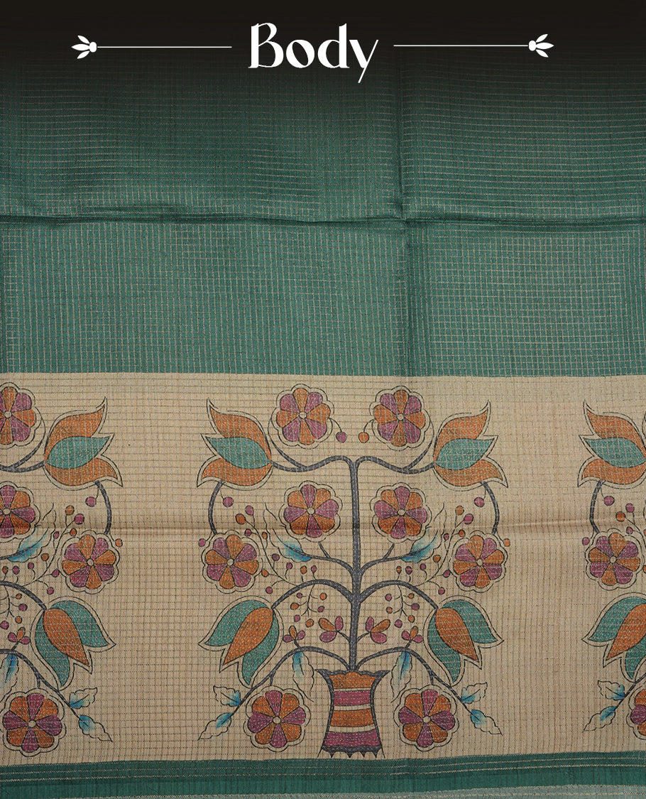 Wheat colour semi tussar silk saree featuring floral print and zari check pattern across body, contrast green colour border and pallu, paired with matching blouse piece.