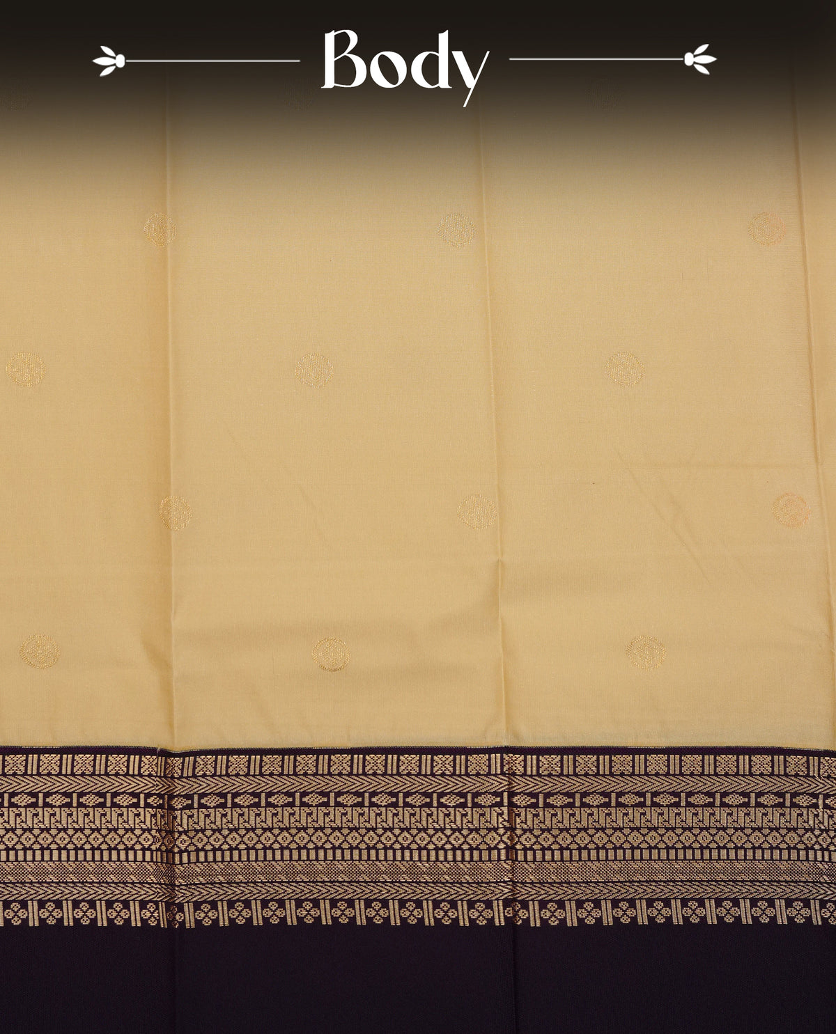 Sandal colour soft silk saree featuring gold zari buttas on body, contrast dark purple colour with gold zari half traditional border, grand pallu comes with matching blouse piece.