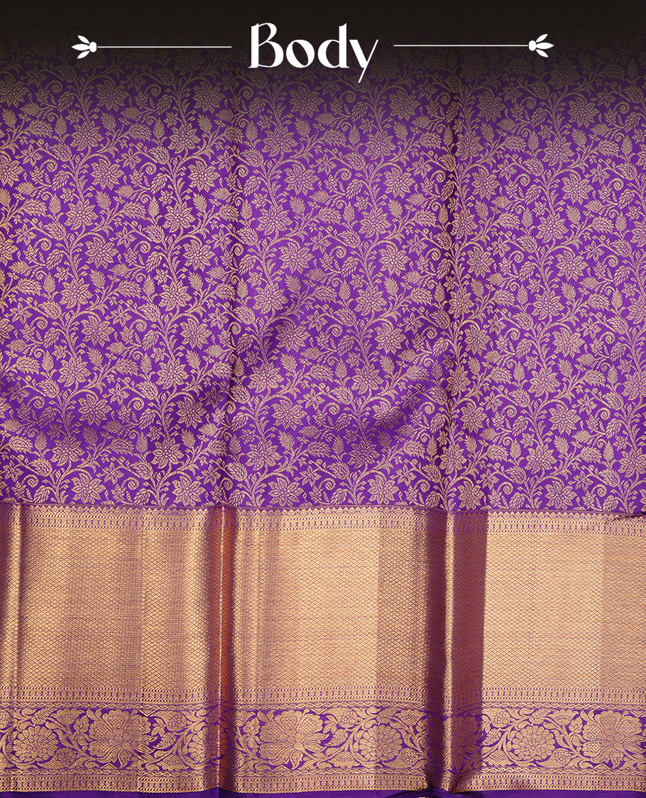 Indigo colour kancheepuram silk saree featuring gold zari pattern across body, complemented by selfcolour border traditional zari border, paired with matching blouse piece.