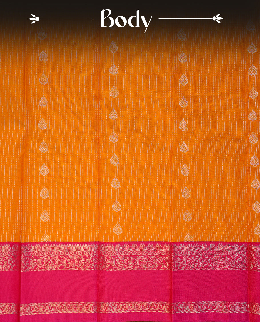 Mustrad coloured soft silk saree featuring silver zari stripes and motifs across the body, enhanced with a contrast Magenta border and pallu, paired with a matching contrast blouse piece.