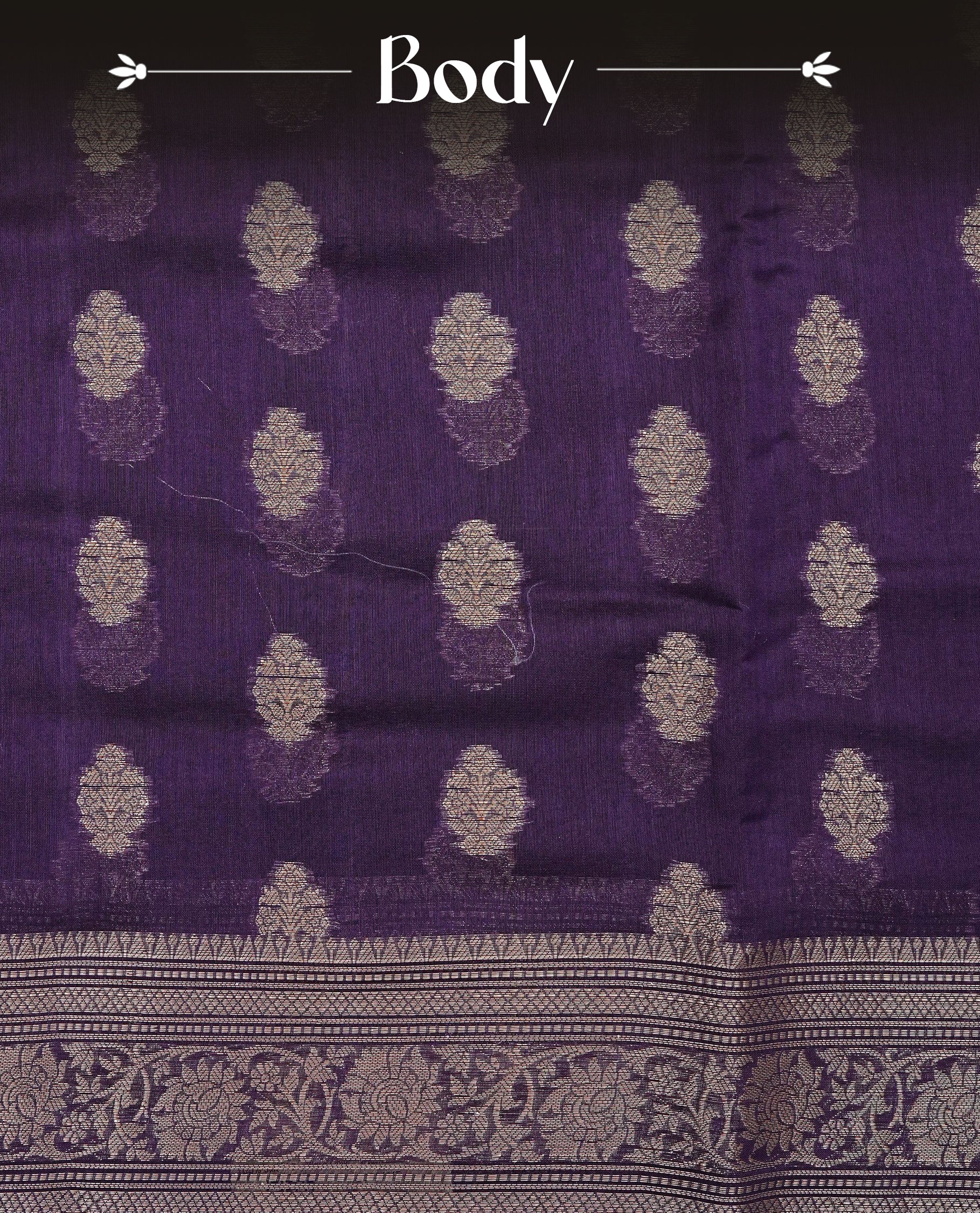 Royal Purple colour Tussar Silk saree featuring antique zari butta motifs on the body, enhanced with a self-coloured floral zari border and pallu, paired with a matching blouse piece.