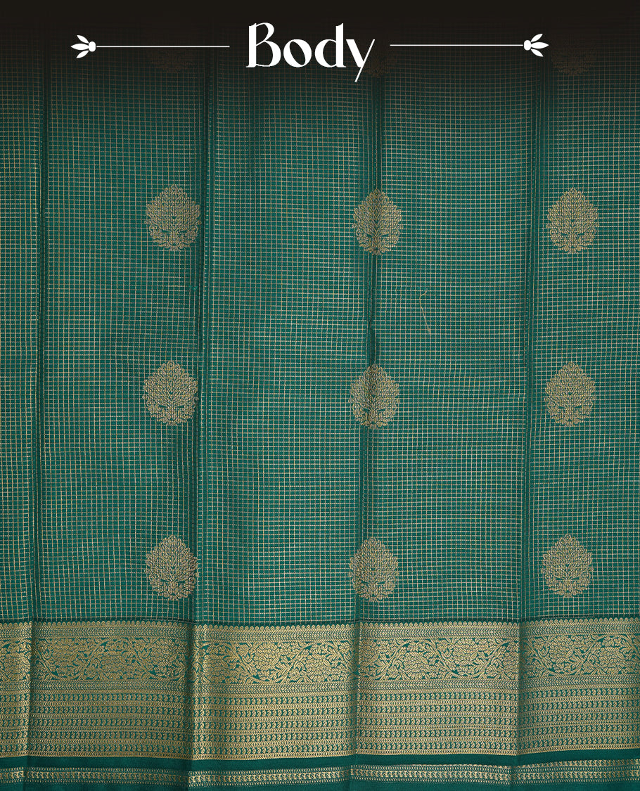 Green coloured soft silk saree featuring gold zari stripes and motifs across the body, enhanced with a Self colour border and pallu, paired with a matching contrast blouse piece.