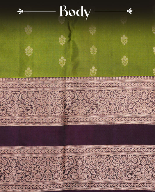Green colour Traditional Kancheepuram Silk Saree with Elegant Gold Zari Buttas on the Body, Enhanced with a Contrast Dark Wine Colour  with Gold Zari Border and Rich Pallu, Paired with a Matching Blouse Piece.