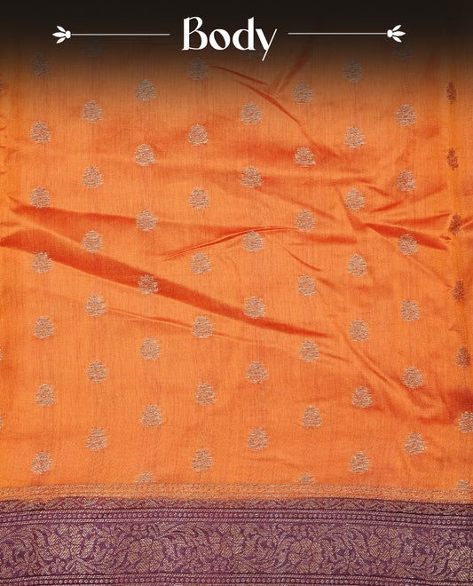 Radiant orange Colour Tussar silk saree with antique zari buttas On Body, a rich Wine floral zari border, an elegant floral zari pallu, Paired With a matching blouse piece.