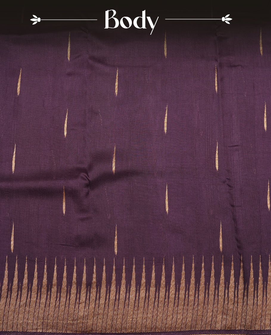 Grape colour semi banaras tussar georgette saree featuring antique gold zari buttas on body, temple pattern on border and floral pattern on pallu, paired with matching blouse piece.