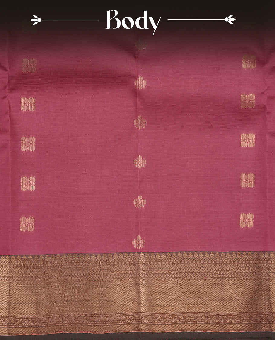 Mauve colour soft silk saree featuring gold zari motifs on the body, complemented by a contrast Green traditional zari border and pallu, paired with matching blouse piece.