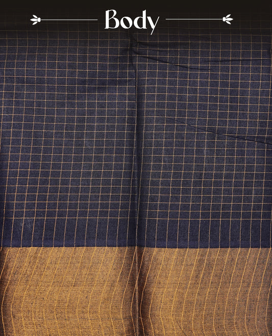 Navy blue colour Sungudi cotton saree featuring elegant gold zari checks across the body, complemented by a contrast gold zari border. Comes with a matching blouse piece.