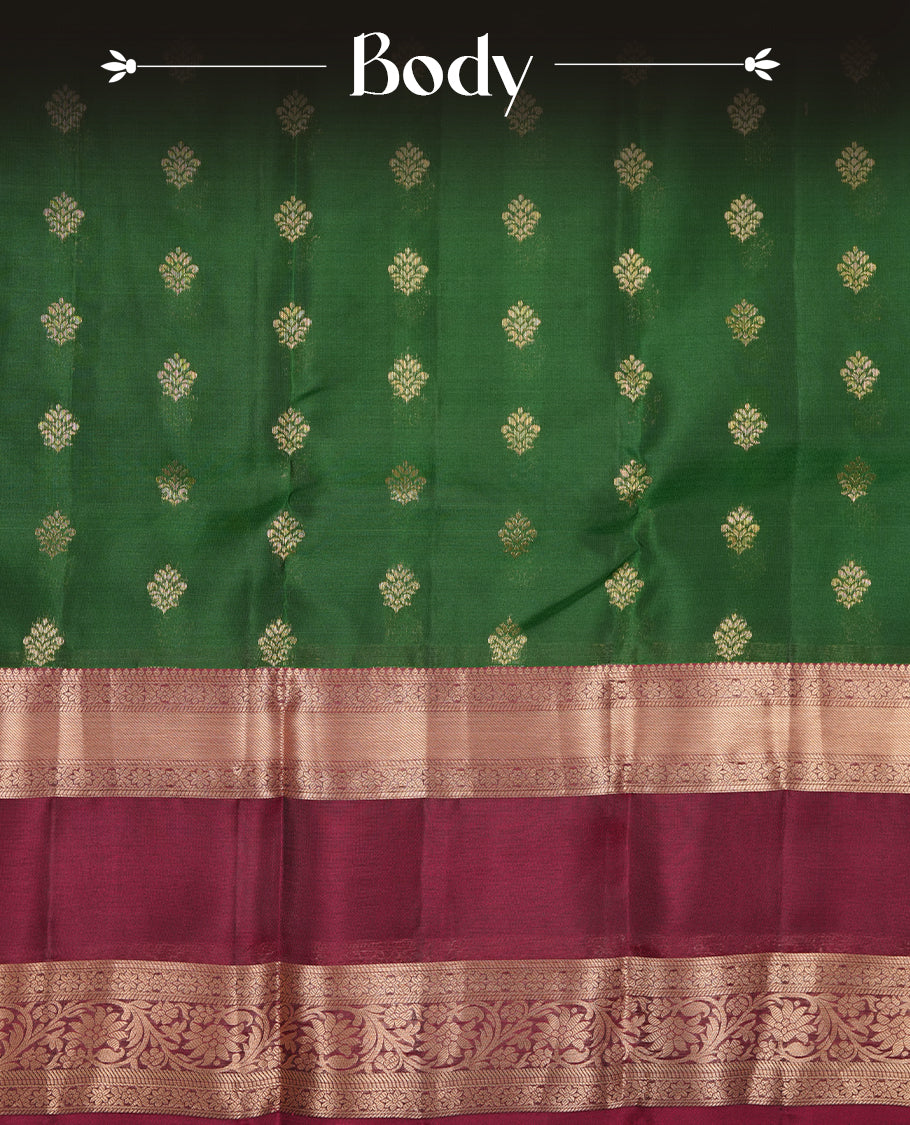 Green colour soft silk saree featuring gold zari motifs on the body, complemented by a contrast Maroon traditional zari border and pallu, paired with a matching blouse piece.
