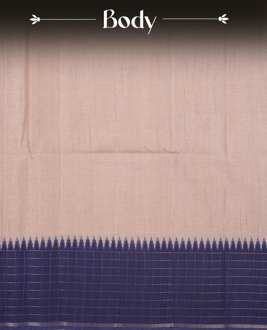 Beige colour semi tussar silk saree highlighting elegant plain body, contrast blue colour border with gold zari box pattern, pallu and comes with matching blouse piece.