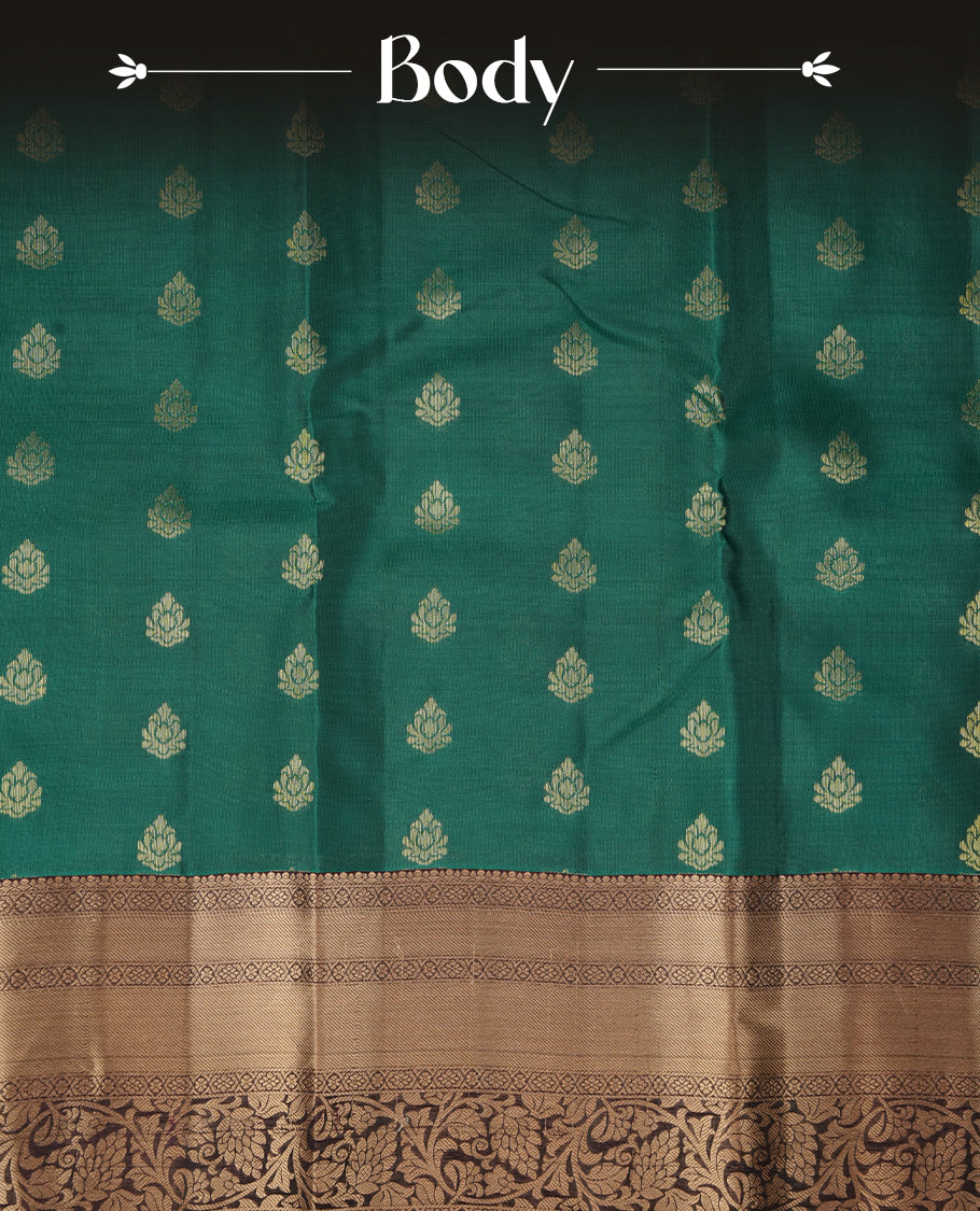 Green colour soft silk saree featuring gold zari motifs on the body, complemented by a contrast Dark purple traditional zari border and pallu, paired with matching blouse piece.