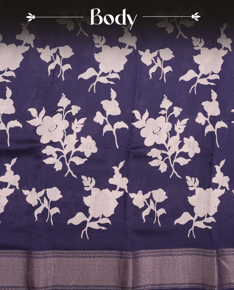 Dark Blue colour Viscos semi printed saree featuring a light golden zari border, abstract off white printed motifs on the body, and comes with a matching blouse