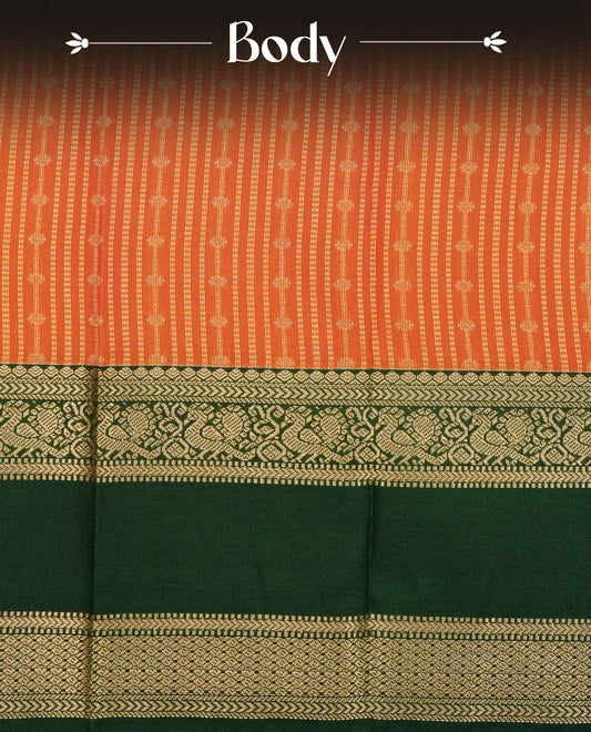 Rust orange colour soft silk saree featuring gold zari stripes with buttas on body, contrast dark green colour gold zari peacock traditional border, grand pallu comes with matching blouse piece.