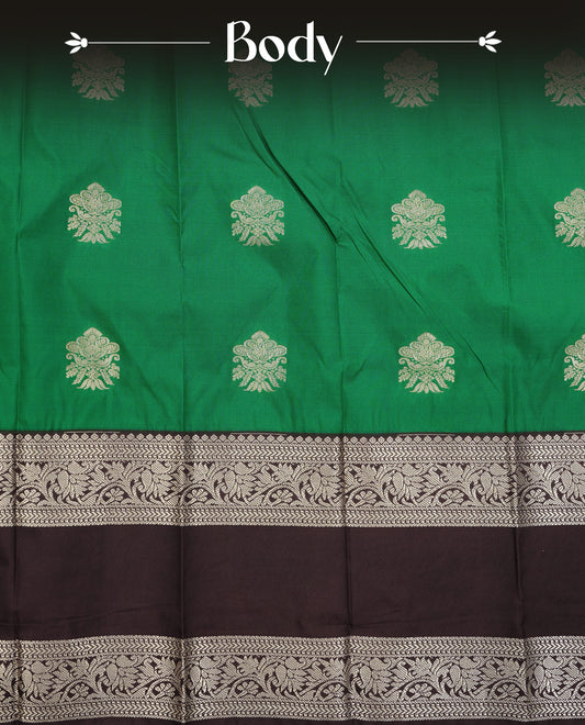 Green colour silk saree featuring gold zari motifs on body, contrast brown with gold zari traditional border, contrast grand pallu comes with matching blouse piece .