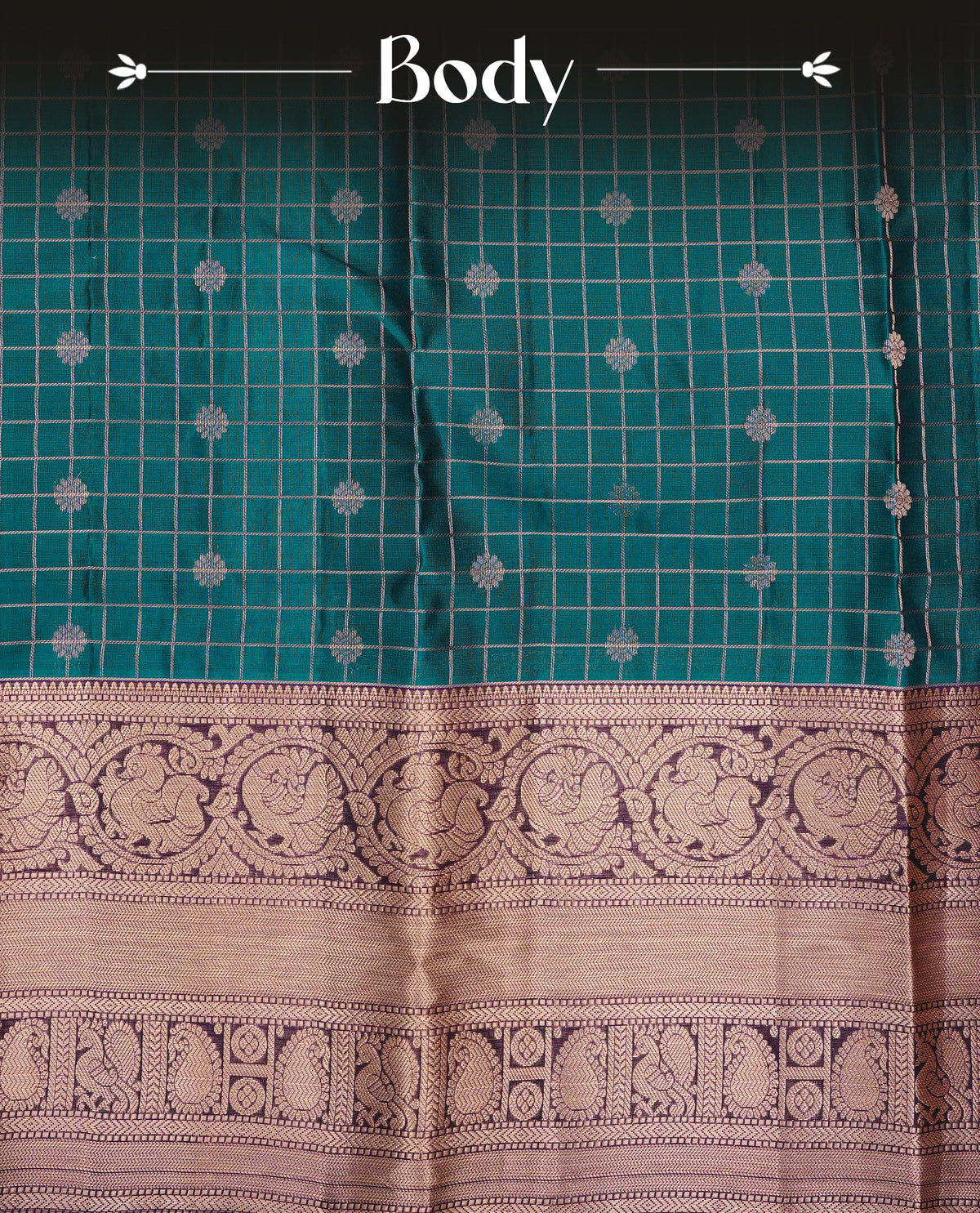 Teal Blue Colour Traditional Kancheepuram Silk Saree with Gold Zari Checks and Delicate Floral Buttas on the Body, Enhanced with a Contrast Purple Colour with Grand Gold Zari Traditional Border and Pallu, Paired with a Matching Blouse Piece.