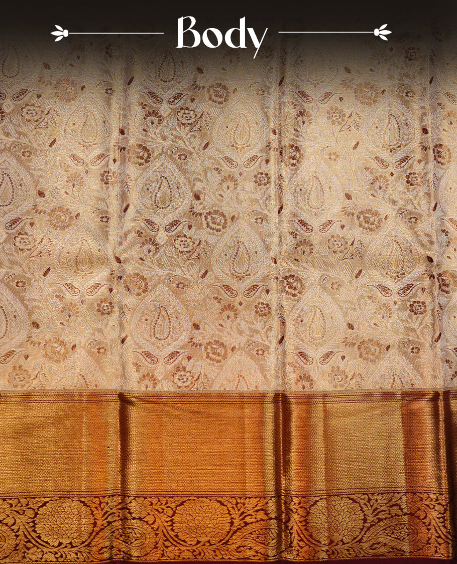 Gold & Maroon double shade colour kancheepuram tissue silk saree featuring gold zari floral kodi pattern on body, complemented by contrast Maroon colour with traditional border, paired with matching blouse piece.