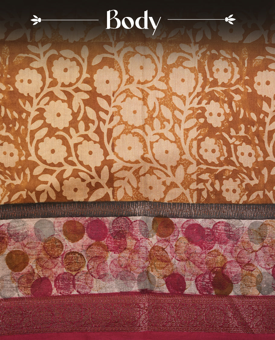 Mustard colour chanderi silk saree featuring floral kodi print pattern across body, with contrast red colour border with zari pattern and paired with matching blouse.