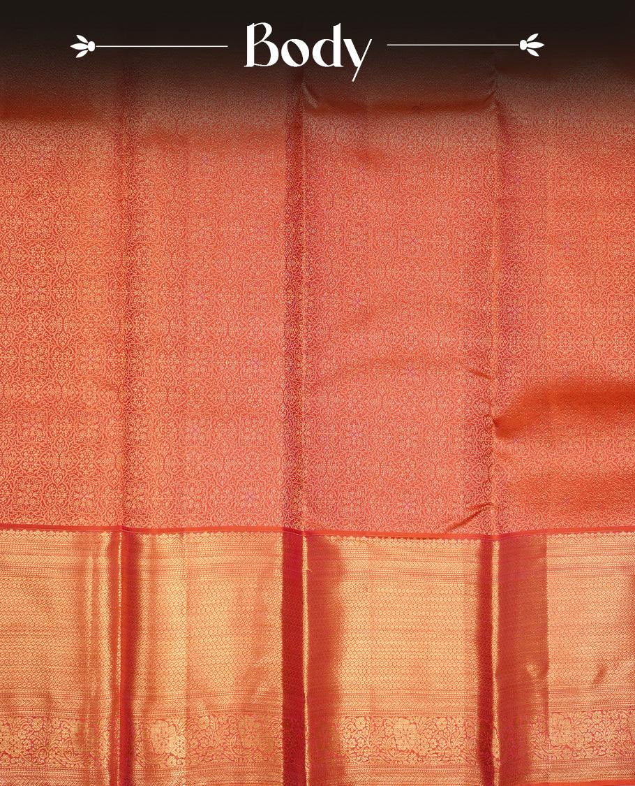 Orange colour kancheepuram silk saree featuring gold zari pattern across body, complemented by selfcolour border traditional zari border, paired with matching blouse piece.