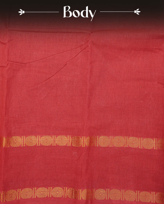 Red Colour  Sungudi Cotton Saree with gold zari motifs on the body, a matching gold zari border, and a plain pallu. Paired with a contrast Dark Green colour  blouse piece  featuring a gold zari peacock border.