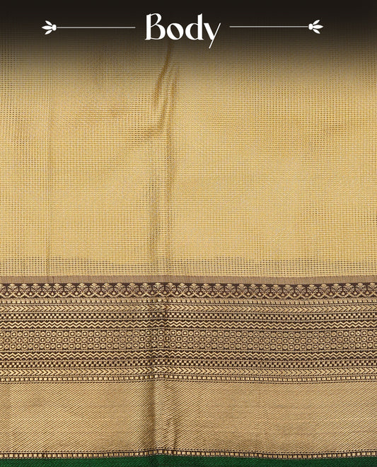 Gold Colour Semi Tissue Silk Saree featuring a lustrous self-textured body, complemented by a richly woven Green and gold zari border, an elegant geometric zari pallu and paired with a matching blouse piece.