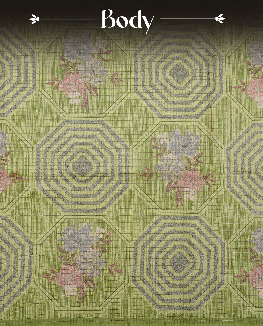 Leaf green colour semi tussar silk saree, featuring subtle hexagonal geometric patterns across the body, a textured pallu with fine detailing, and finished with a matching blouse.