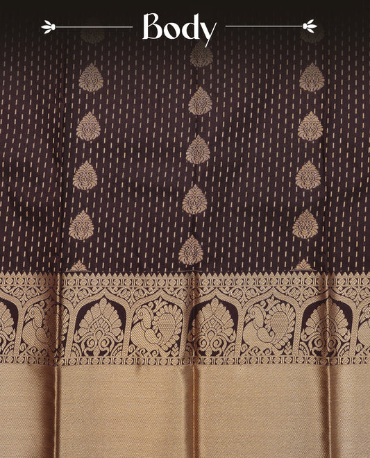 Dark chocolate colour soft silk saree featuring gold zari stripes with floral motifs on body,contrast  by self colour gold zari peacock & floral traditional border, grand pallu comes with matching blouse piece.