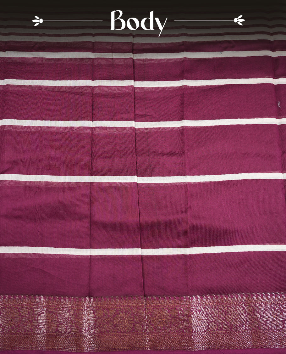 Purple colour chanderi silk saree featuring white stripped print pattern across body, with Antique zari pattern border and paired with matching blouse.